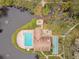 Aerial view of community pool, tennis courts, and clubhouse at 635 30Th Ave W # F206, Bradenton, FL 34205
