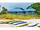 Beachfront cabana with paddleboards at 635 30Th Ave W # F206, Bradenton, FL 34205