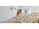 Cozy bedroom with floral bedding and window views at 635 30Th Ave W # F206, Bradenton, FL 34205