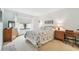 Bedroom with a double bed, dresser, and desk at 635 30Th Ave W # F206, Bradenton, FL 34205