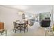 Condo dining area with table and chairs at 635 30Th Ave W # F206, Bradenton, FL 34205