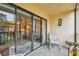 Private screened balcony with seating at 635 30Th Ave W # F206, Bradenton, FL 34205