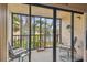 Relaxing screened balcony overlooking the lake at 635 30Th Ave W # F206, Bradenton, FL 34205