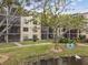 Building exterior with pond view at 635 30Th Ave W # F206, Bradenton, FL 34205