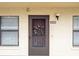 Condo front door entrance with wreath decoration at 635 30Th Ave W # F206, Bradenton, FL 34205