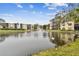Serene pond with fountain and swans in front of condo building at 635 30Th Ave W # F206, Bradenton, FL 34205