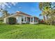 Charming home with a screened patio and lush landscaping at 6723 Approach Rd # 35, Sarasota, FL 34238