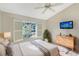 Bedroom with light and airy feel, featuring a ceiling fan at 6723 Approach Rd # 35, Sarasota, FL 34238