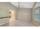 Bright dining room with tiled floors and access to kitchen and lanai at 6723 Approach Rd # 35, Sarasota, FL 34238