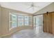 Dining area with tiled floors and sliding doors leading to outdoor space at 6723 Approach Rd # 35, Sarasota, FL 34238