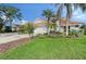 Single-Gathering home with a two-car garage and lush landscaping at 6723 Approach Rd # 35, Sarasota, FL 34238
