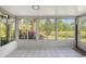 Bright sunroom overlooking a tranquil pond at 6723 Approach Rd # 35, Sarasota, FL 34238