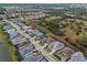 Aerial view of the house and surrounding neighborhood at 7139 Tamworth Pkwy, Sarasota, FL 34241
