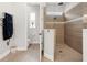 Spa-like bathroom with walk-in shower and heated towel rack at 7139 Tamworth Pkwy, Sarasota, FL 34241