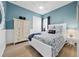 Light and airy bedroom with white furniture and coastal decor at 7139 Tamworth Pkwy, Sarasota, FL 34241