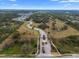 Community entrance with gated access and landscaping at 7139 Tamworth Pkwy, Sarasota, FL 34241