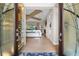 Bright and spacious entry with a wine cellar feature at 7139 Tamworth Pkwy, Sarasota, FL 34241