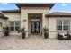 Elegant entryway with double doors and a paver driveway at 7139 Tamworth Pkwy, Sarasota, FL 34241