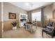 Bright home office features built-in shelving and comfortable seating at 7139 Tamworth Pkwy, Sarasota, FL 34241