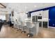 Modern kitchen with stainless steel appliances and breakfast bar at 7139 Tamworth Pkwy, Sarasota, FL 34241