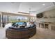 Large covered patio overlooking pool, with comfortable seating and a wet bar at 7139 Tamworth Pkwy, Sarasota, FL 34241