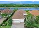 Single-Gathering home with two-car garage, located on a lakefront community at 7220 Whittlebury Trl, Lakewood Ranch, FL 34202