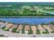 Aerial view of home on the golf course with water access at 7220 Whittlebury Trl, Lakewood Ranch, FL 34202