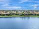 Aerial view of homes along a tranquil waterfront at 7220 Whittlebury Trl, Lakewood Ranch, FL 34202