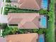 Single-Gathering home with pool and lush landscaping in a residential community at 7220 Whittlebury Trl, Lakewood Ranch, FL 34202