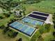 Aerial view of community tennis and pickleball courts at 7220 Whittlebury Trl, Lakewood Ranch, FL 34202