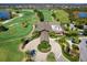Golf clubhouse with circular driveway at 7220 Whittlebury Trl, Lakewood Ranch, FL 34202