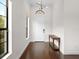 Bright and airy entryway with hardwood floors and natural light at 7220 Whittlebury Trl, Lakewood Ranch, FL 34202