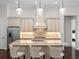 Gourmet kitchen with granite countertops, custom cabinetry, and stainless steel appliances at 7220 Whittlebury Trl, Lakewood Ranch, FL 34202