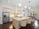 Modern kitchen with stainless steel appliances and granite countertops at 7220 Whittlebury Trl, Lakewood Ranch, FL 34202