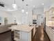 Spacious kitchen with large island and breakfast bar, perfect for entertaining at 7220 Whittlebury Trl, Lakewood Ranch, FL 34202