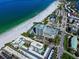 Aerial view showing building and beach access at 800 Benjamin Franklin Dr # 202, Sarasota, FL 34236