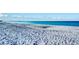 Expansive sandy beach with ocean waves and clear blue water at 800 Benjamin Franklin Dr # 202, Sarasota, FL 34236