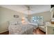 Guest bedroom with two twin beds and ocean view at 800 Benjamin Franklin Dr # 202, Sarasota, FL 34236