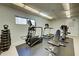 Well-equipped fitness center with various machines at 800 Benjamin Franklin Dr # 202, Sarasota, FL 34236
