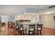 Modern kitchen with granite counters, white cabinets, and breakfast bar at 800 Benjamin Franklin Dr # 202, Sarasota, FL 34236