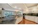 Updated kitchen with granite countertops and stainless steel appliances at 800 Benjamin Franklin Dr # 202, Sarasota, FL 34236
