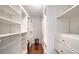 Spacious walk-in closet with ample shelving and storage at 800 Benjamin Franklin Dr # 202, Sarasota, FL 34236