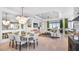 Open concept living area showcasing a spacious living and dining area at 8040 Moonbeam Avenue, Sarasota, FL 34241