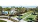 Community bocce ball courts with nearby seating and landscaping at 8125 Moonbeam Ave, Sarasota, FL 34241