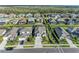 Community overview showcasing a two-story house and neighborhood at 8273 Shooting Star Rd, Sarasota, FL 34241