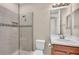 Bathroom with shower, toilet and vanity at 8273 Shooting Star Rd, Sarasota, FL 34241