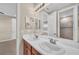 Double vanity bathroom with modern fixtures at 8273 Shooting Star Rd, Sarasota, FL 34241