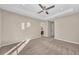 Spacious bedroom featuring a ceiling fan and neutral wall colors at 8273 Shooting Star Rd, Sarasota, FL 34241