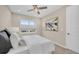 Cozy bedroom with a queen bed and window views at 8273 Shooting Star Rd, Sarasota, FL 34241
