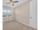 Bright bedroom featuring neutral walls and carpet at 8273 Shooting Star Rd, Sarasota, FL 34241